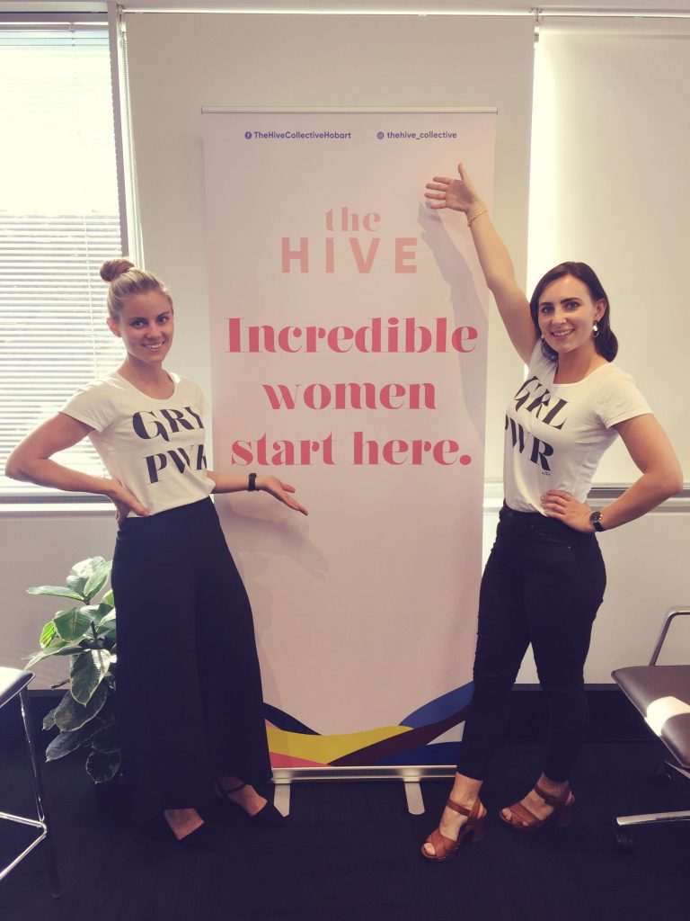 Linda and Annie with the Hive banner