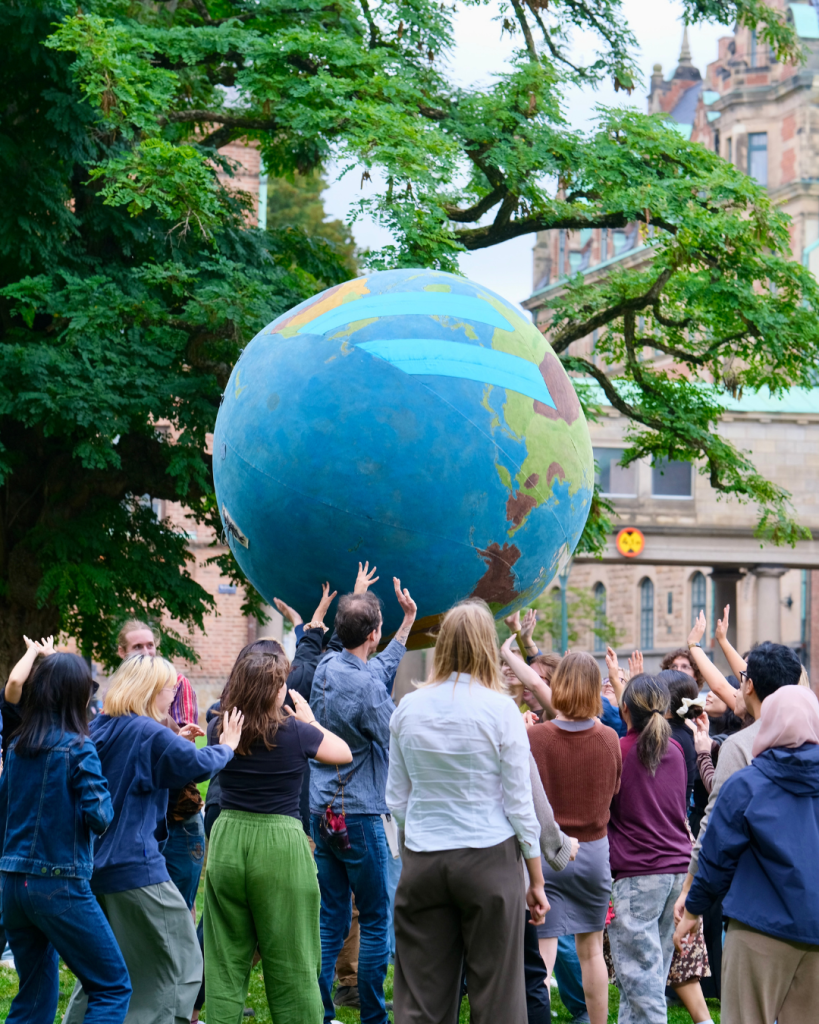 Students holding a big blobe in Lund